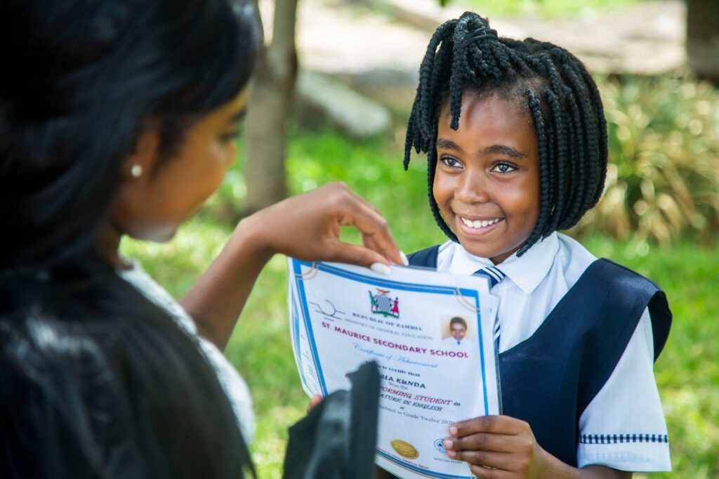 pexels-photo-6368521 A Girl Holding a Diploma